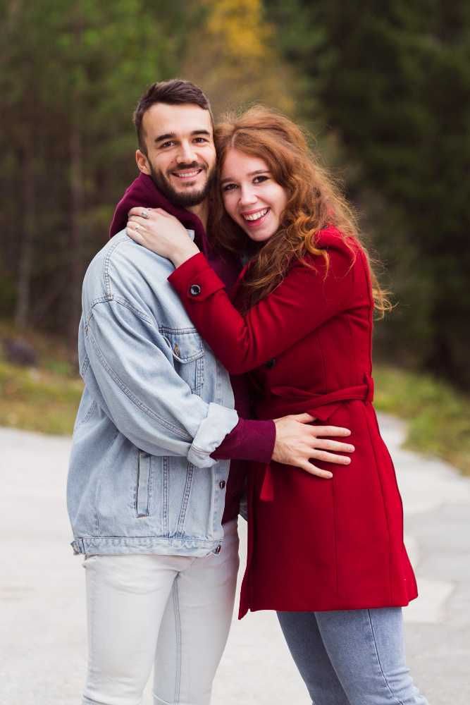 Married couple reviewing paperwork together (joint property ownership)