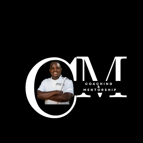 Chef mentoring student in kitchen