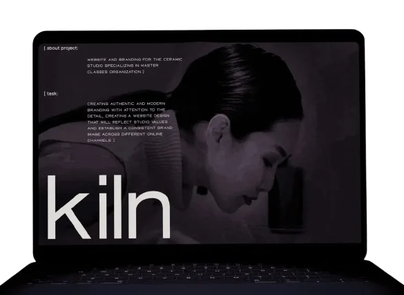 A laptop screen displaying black and white image.