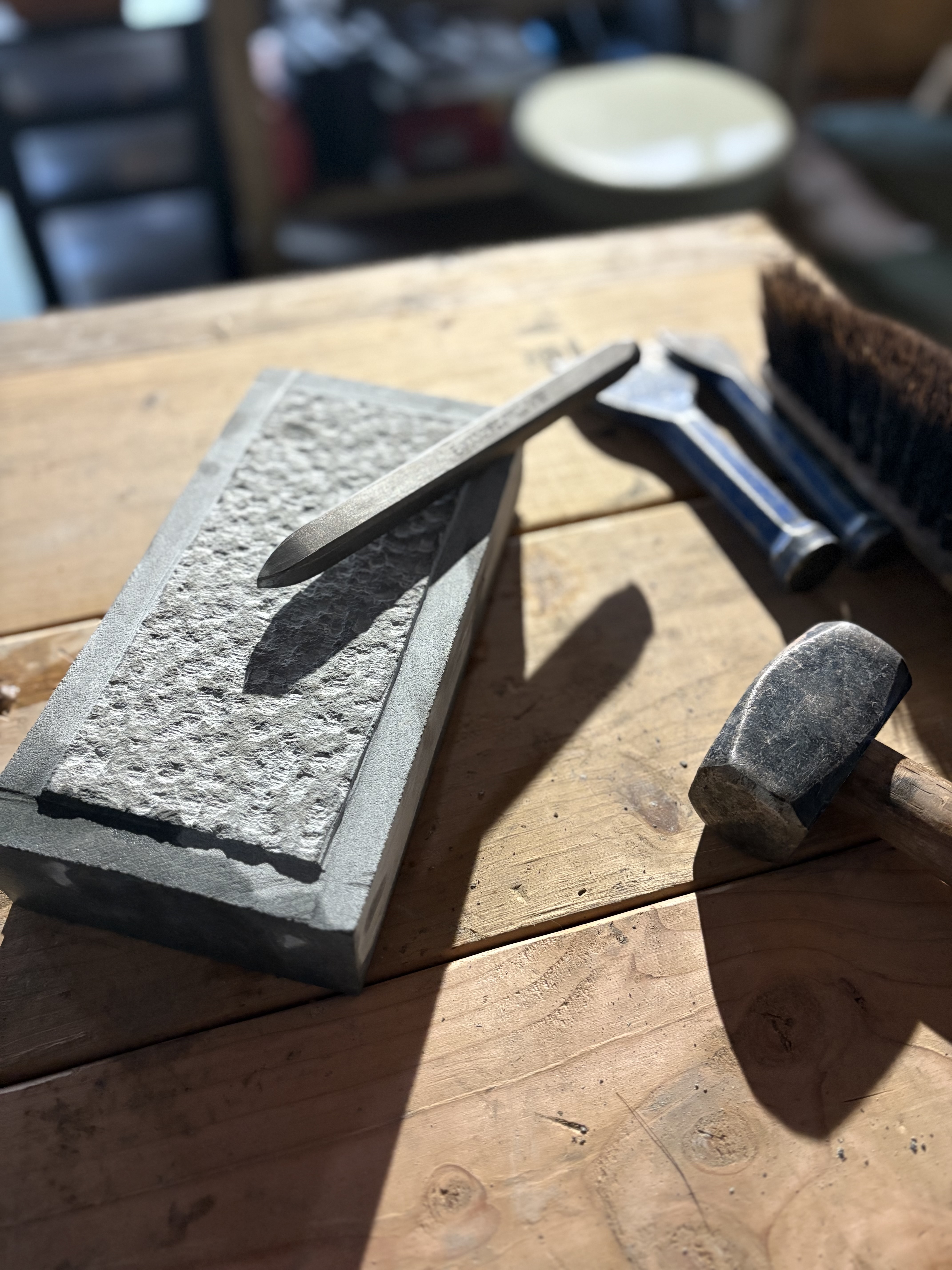 Close-up of drafted margin stonework — a traditional hand-cut masonry technique by Dan Quinn