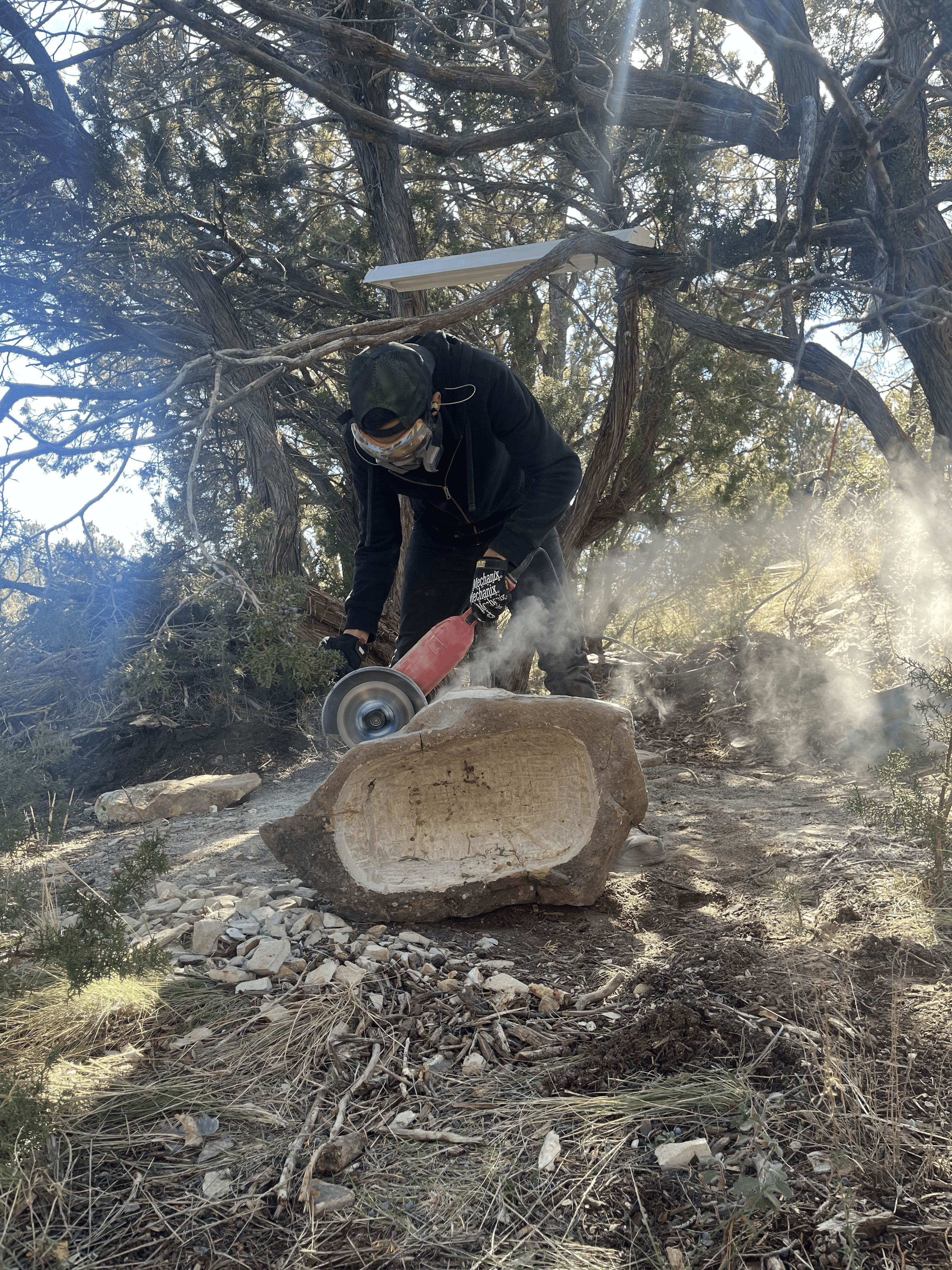Dan Quinn grinding a custom fountain basin by hand, Genesee Valley Stone Works