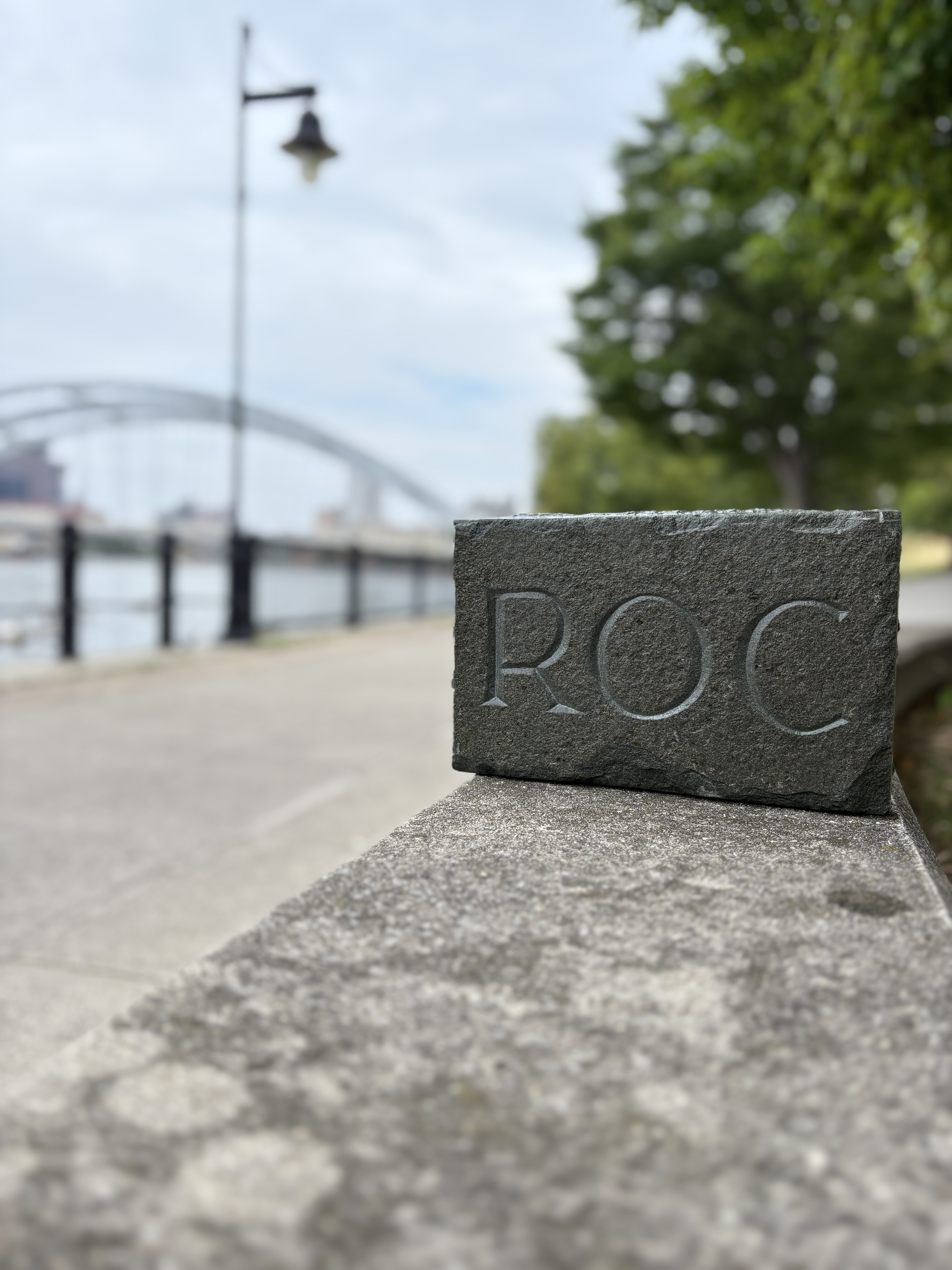 Hand-carved ROC stone sign — custom stone lettering by Genesee Valley Stone Works, Rochester NY