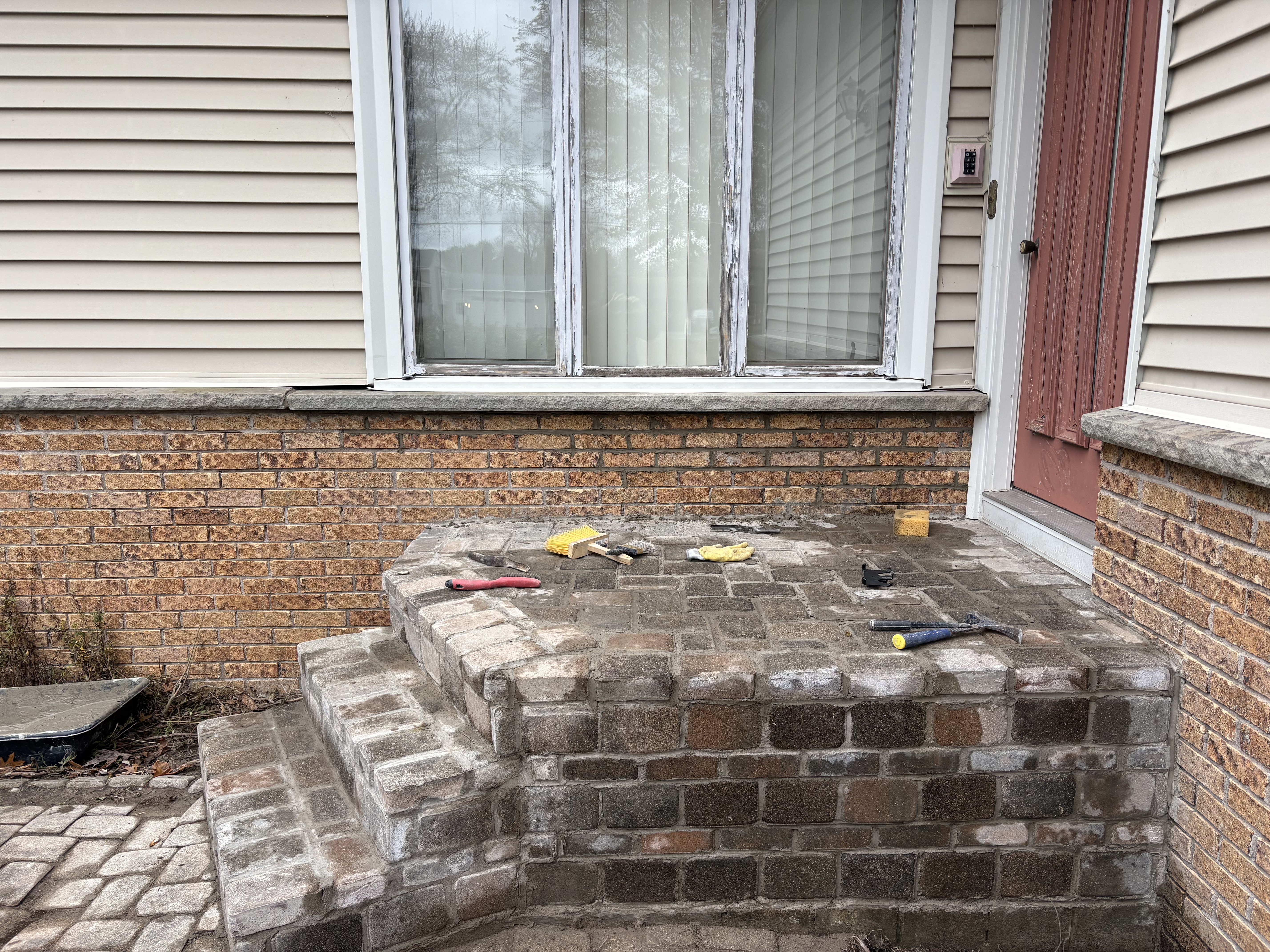 Custom natural stone patio installed by Genesee Valley Stone Works, Rochester NY