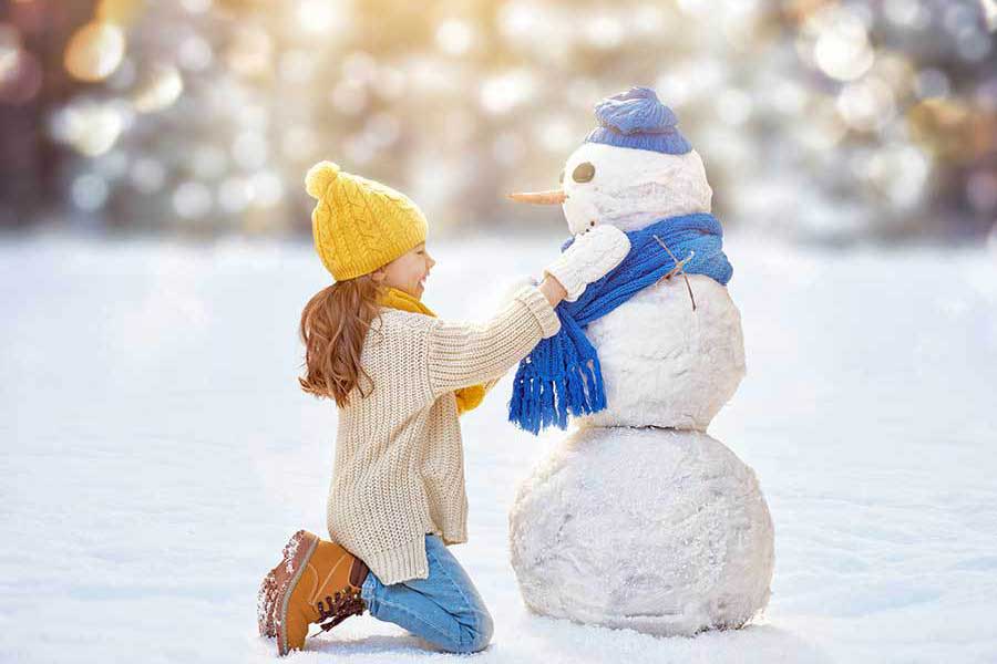 building a snowman after-school holiday activities