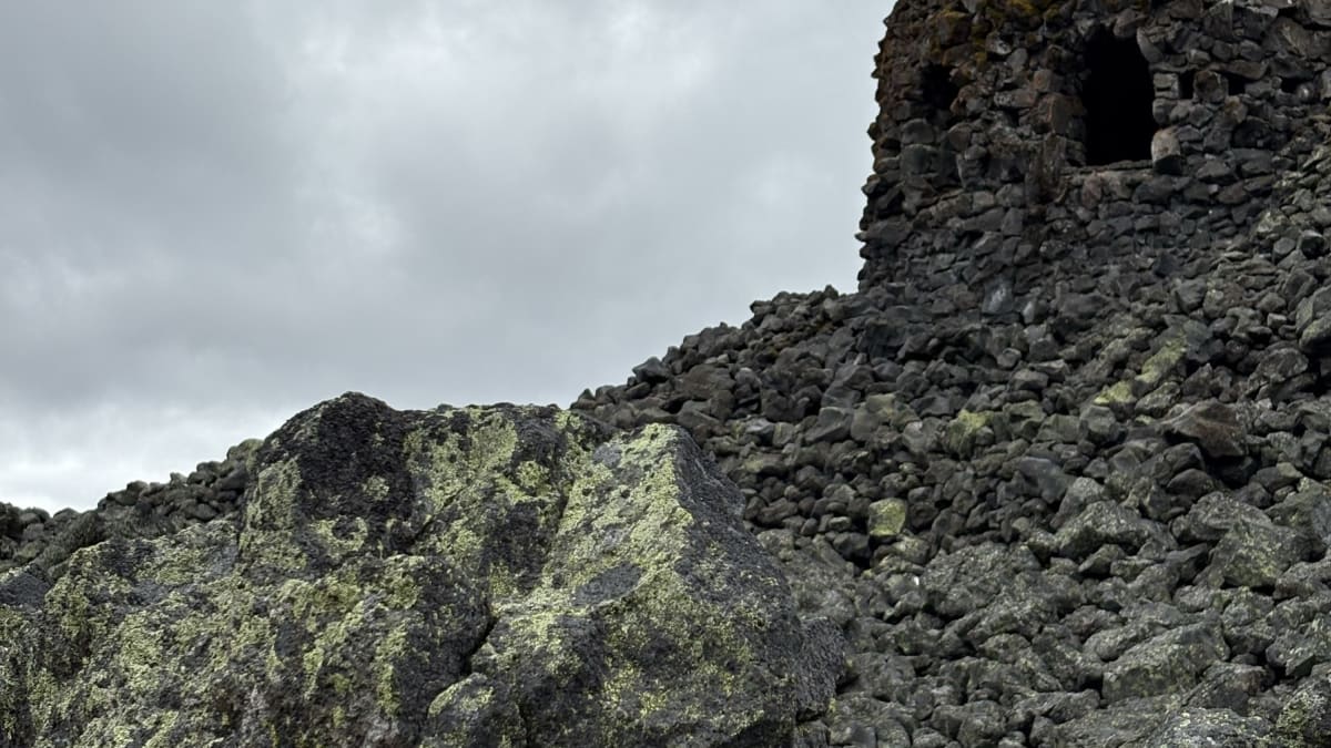The stone Dee Wright Observatory rising from the lava at McKenzie Pass