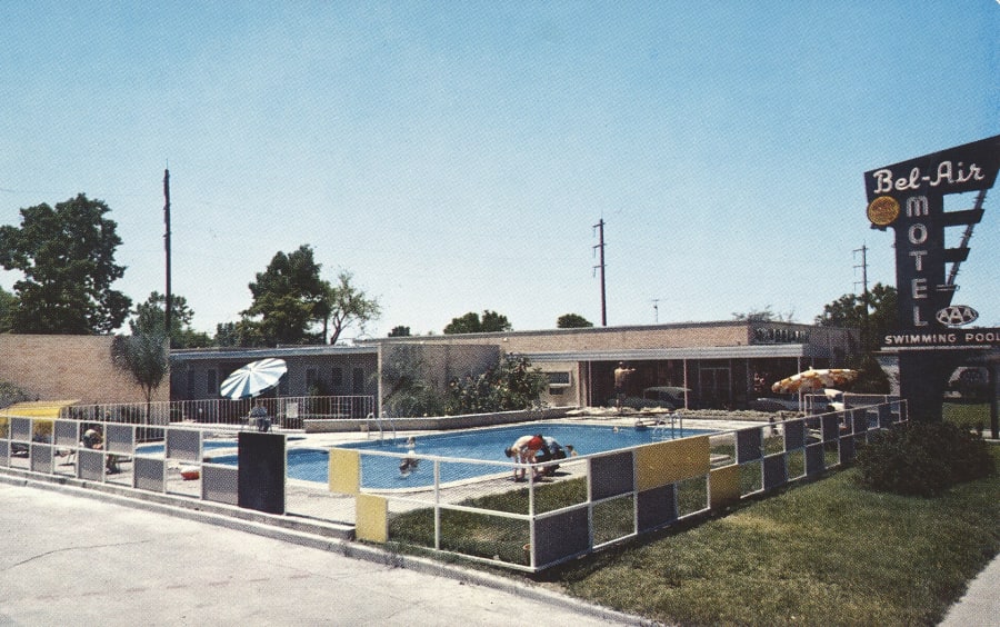 A vintage postcard of a motel swimming pool in New Orleans