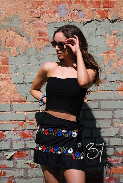 Professional headshot of Caitie, a portrait photographer at Studio37 Photography in Pinehurst, TX.