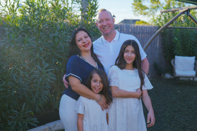 Professional photographer capturing stunning portraits at Studio37 Photography in Pinehurst, TX.