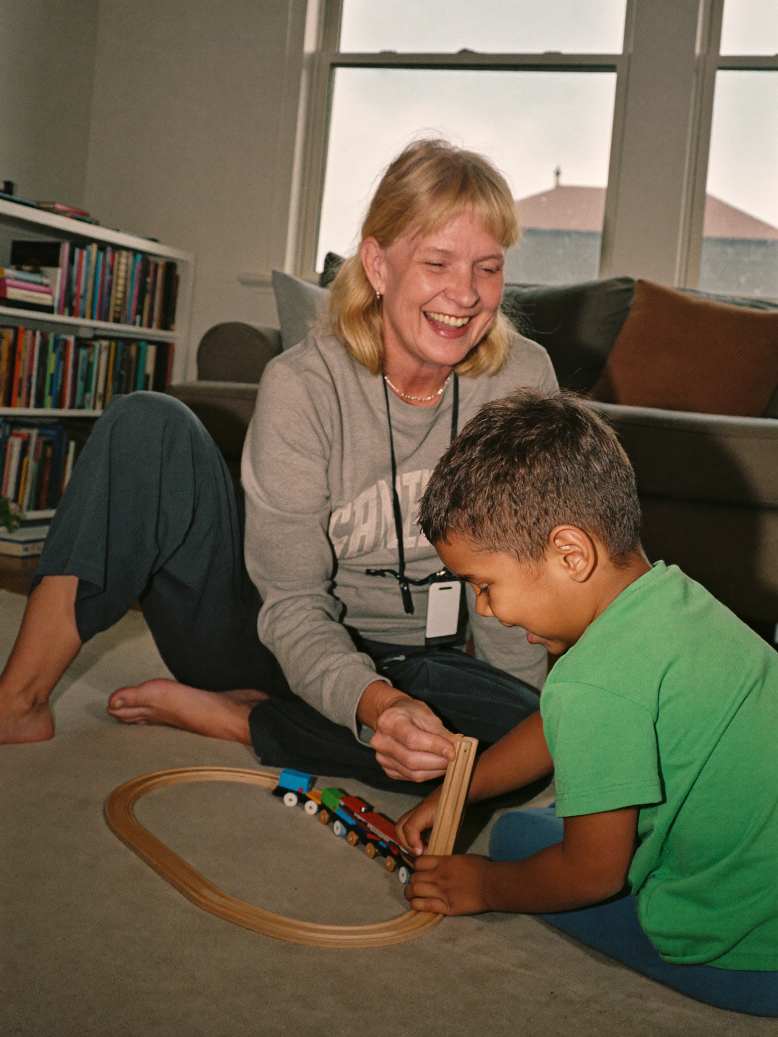Woman playing with grandkids