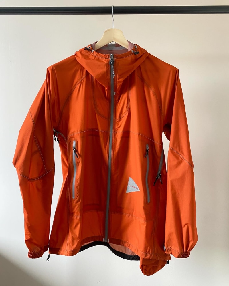 AND WANDER 3L UL Rain Jacket — Burnt Orange · L & XL