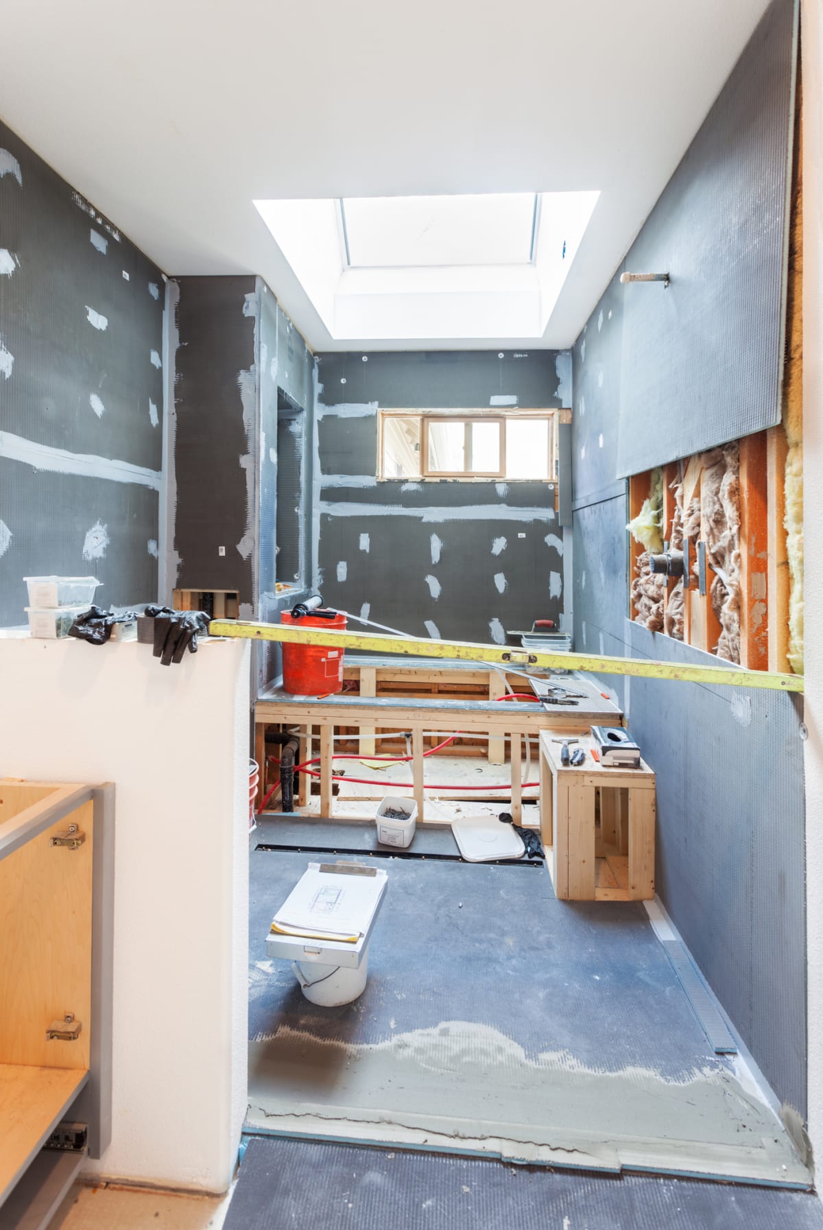 Waterproofing and surface prep during a HousePro bathroom remodel