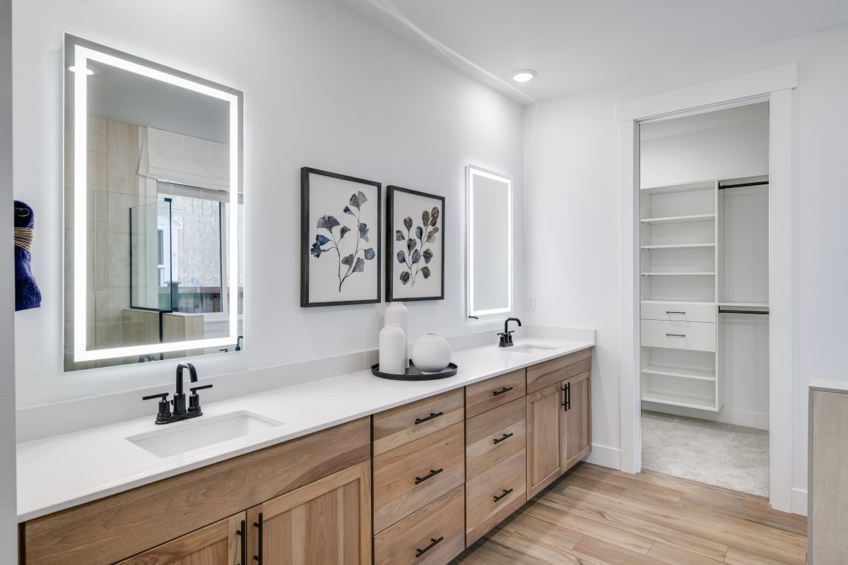 Modern bathroom remodel with designer finishes by HousePro