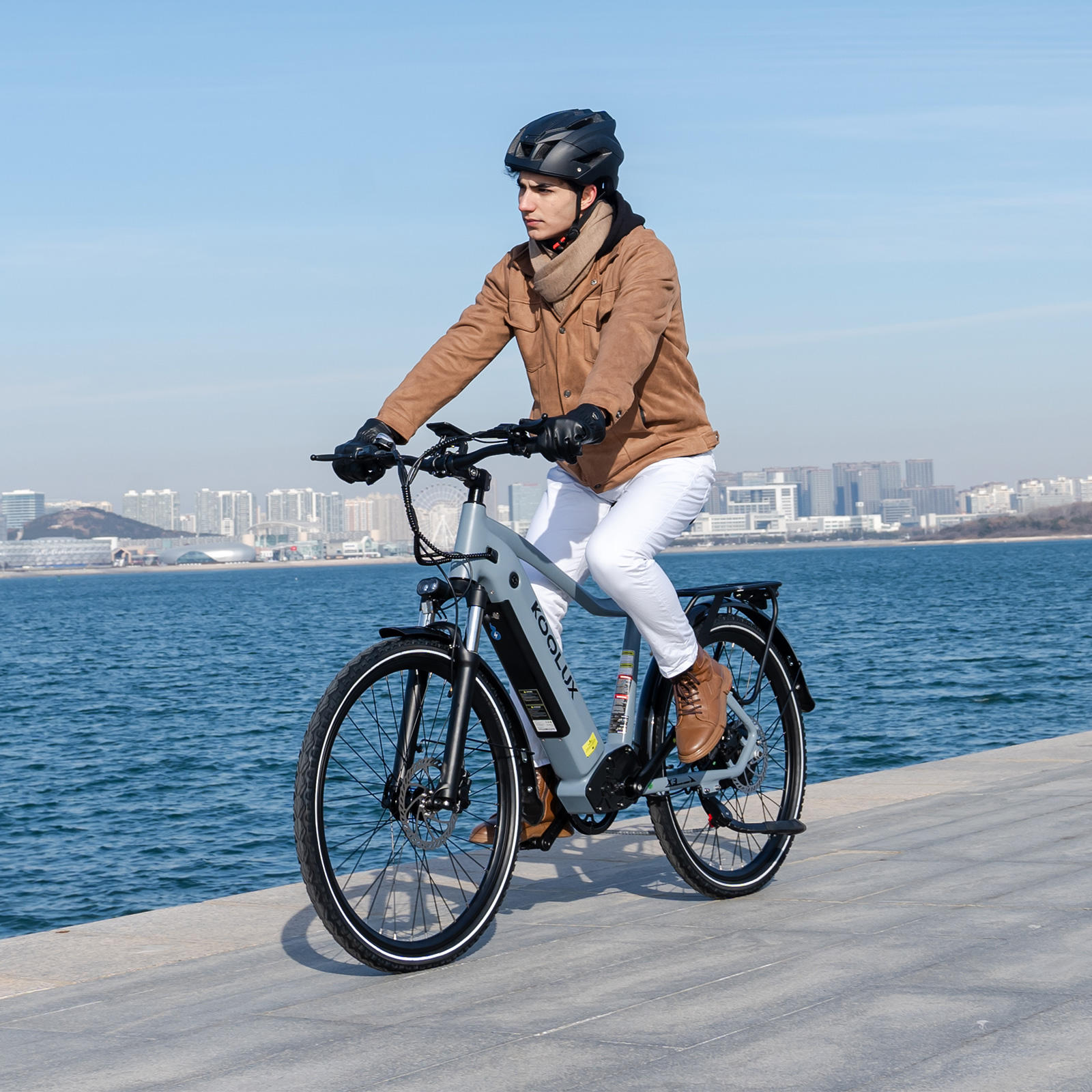 KOOLUX X3 Commuter Electric Bike model riding on beach