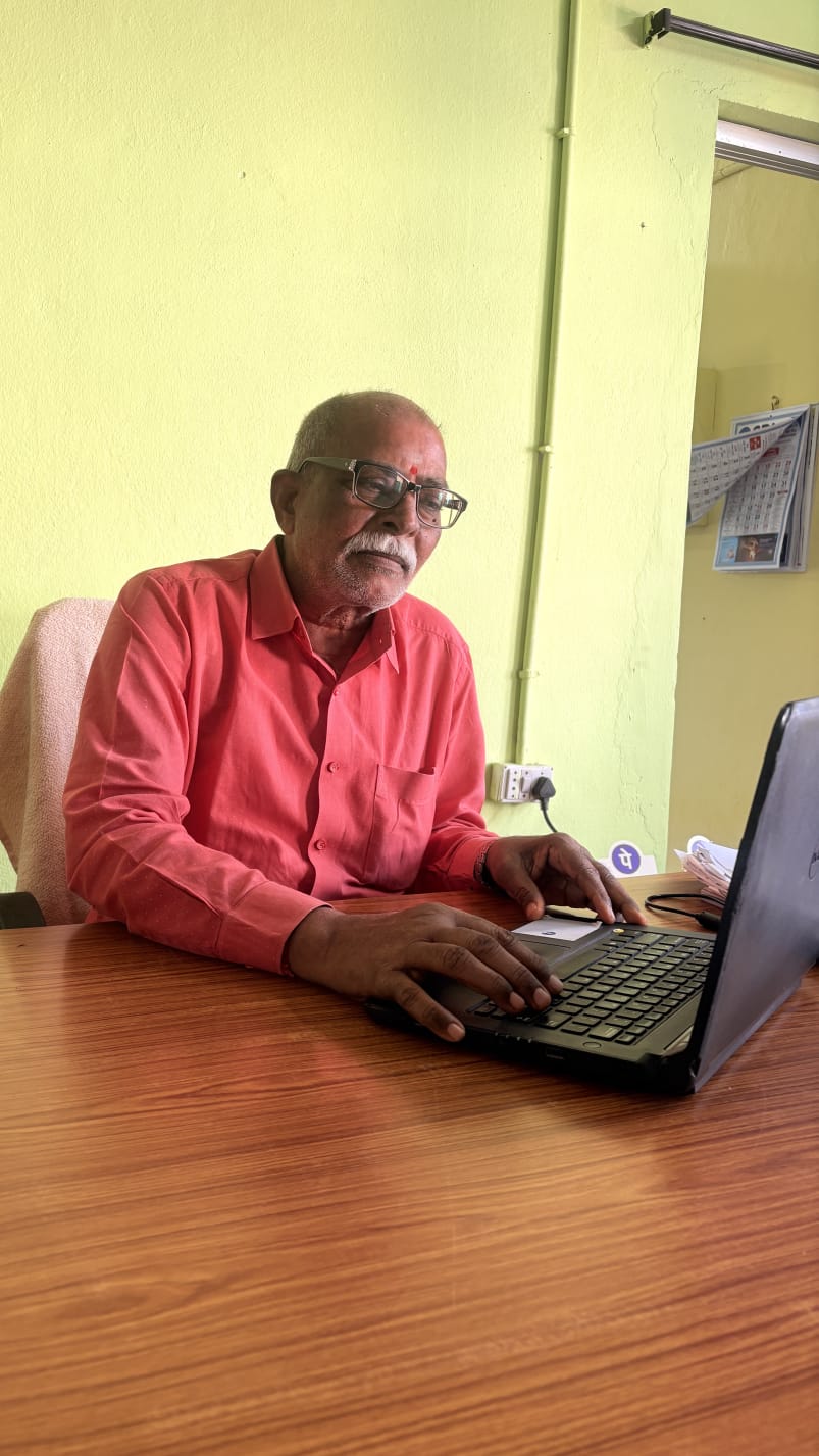 Principal of Siddartha ITI working at his desk