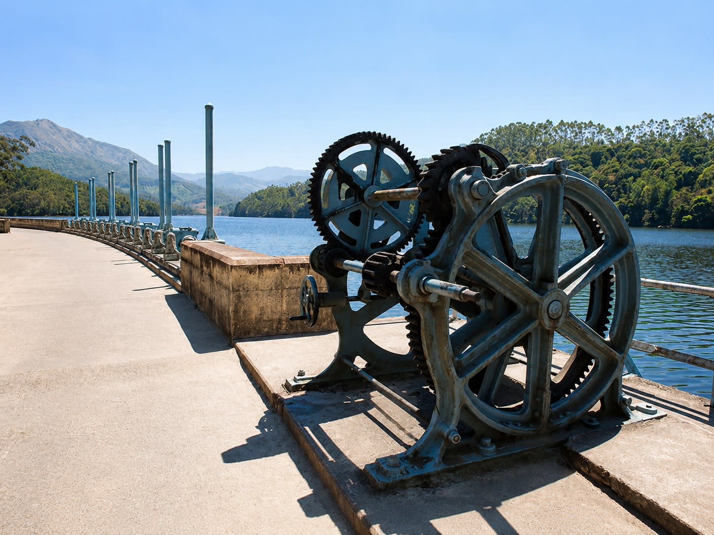 Mattupetty Dam and reservoir surrounded by hills in Munnar, Kerala