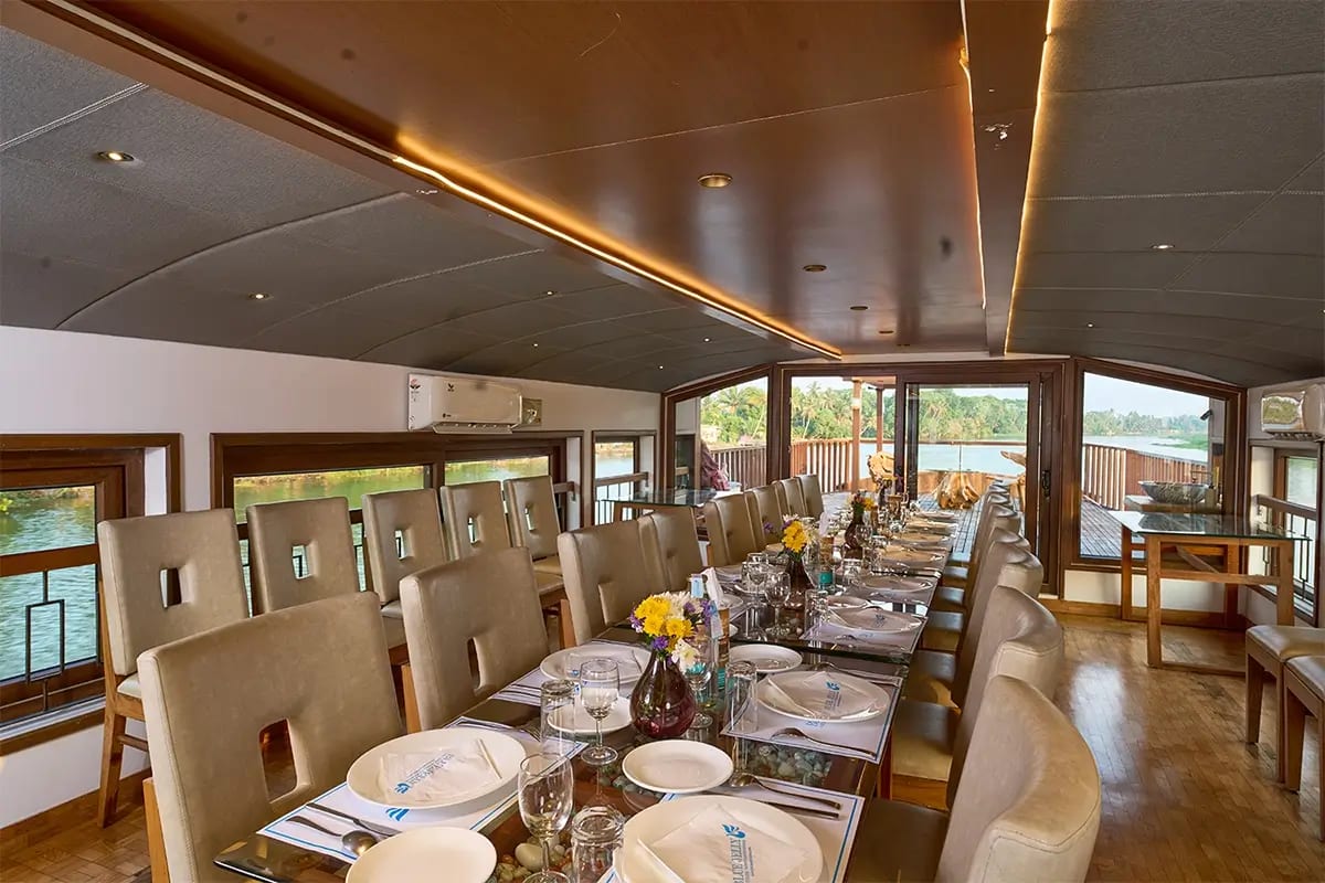 Luxury houseboat dining area in Alleppey Kerala