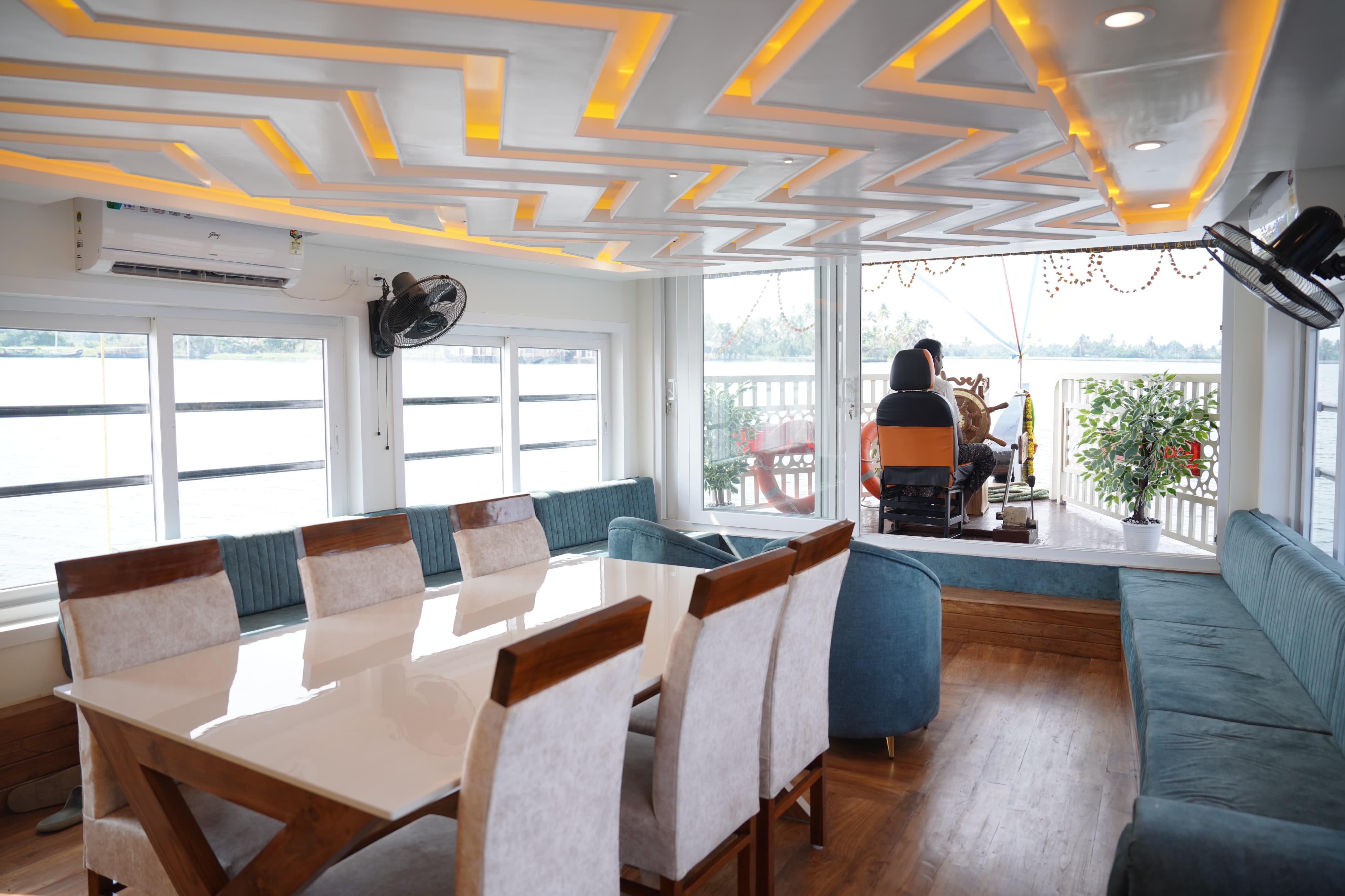 Bed O Inn premium houseboat living area Alleppey