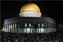 Tens of thousands of Muslim worshippers pray at the Al-Aqsa mosque compound on Qadr Night (Laylat al-Qadr) during the month of Ramadan in Jerusalem's Old City, April 27, 2022. Photo by Jamal Awad/Flash90.png