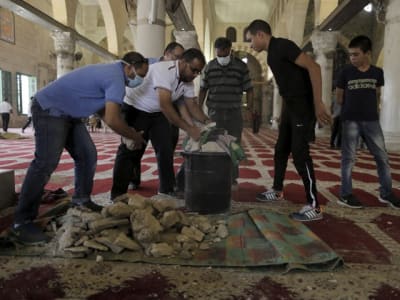 Gathering stones that were stored in Al-aqsa