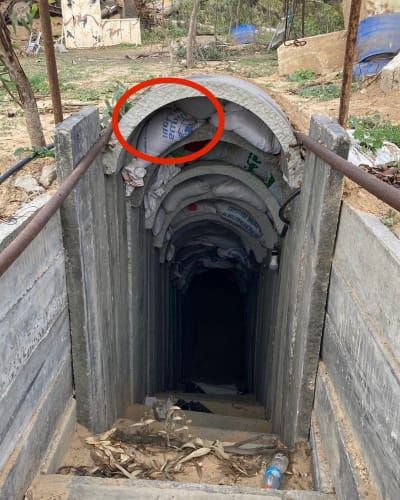UNRWA bags jammed at a Hamas tunnel entrance