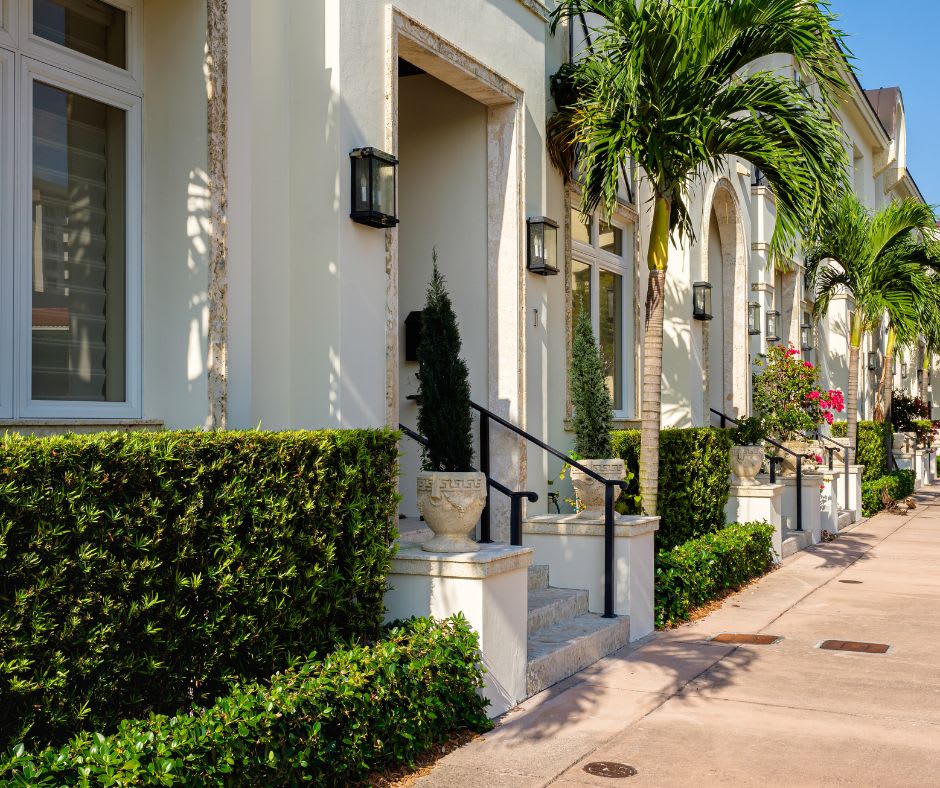 A row of pre-construction townhomes seen in Miami, FL during the day.