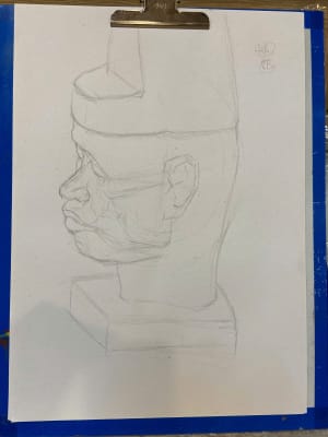 Young man leanrt head drawing