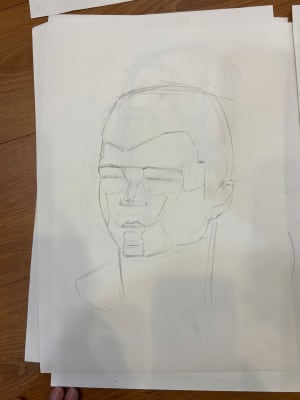 Young man leanrt head drawing