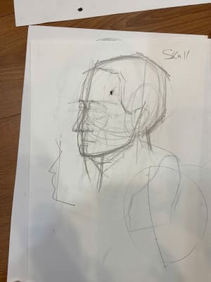 Young man leanrt head drawing