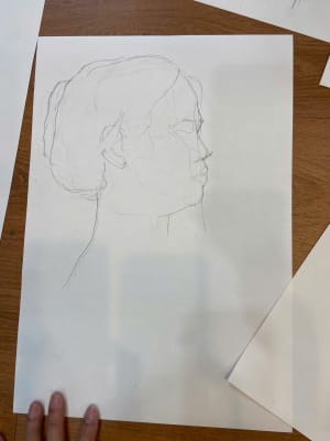 Young man leanrt head drawing