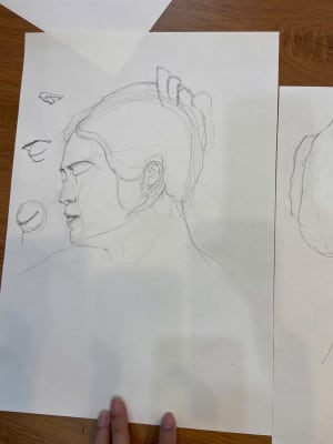 Young man leanrt head drawing