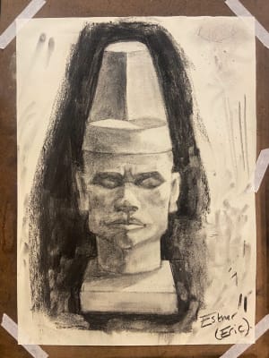 Lady studies with charcoal