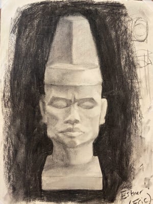 Lady studies with charcoal