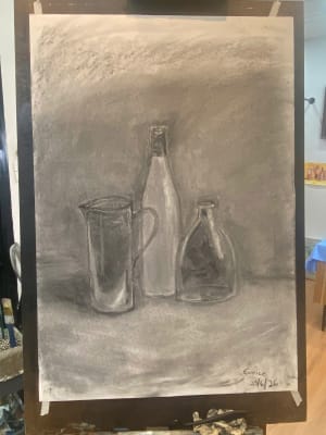 Lady studies with charcoal