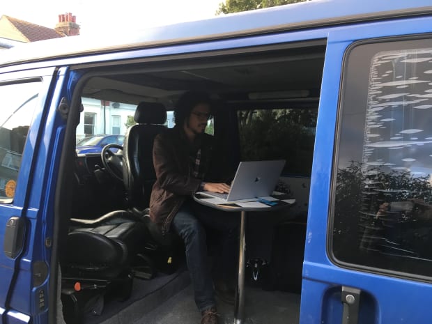 Me testing out working on my laptop from the campervan