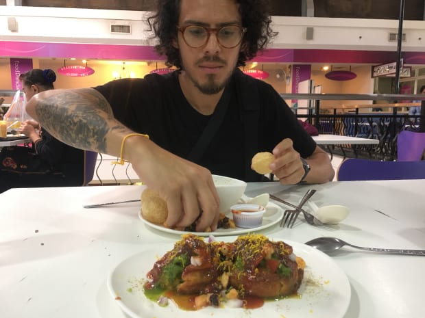 Eating some chat in a Little India shopping centre food court
