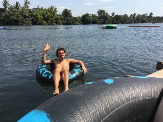 Me hanging out in a rubber ring on the river in Kampot