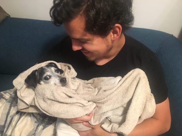 Me holding Maybae like a furry child