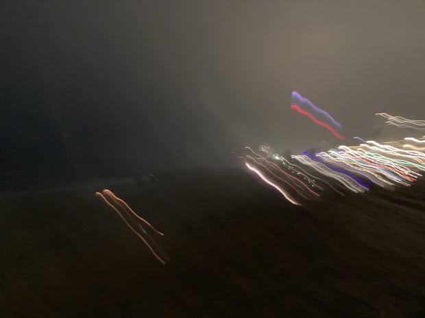 A blurred photo of Brighton sea front lights at night