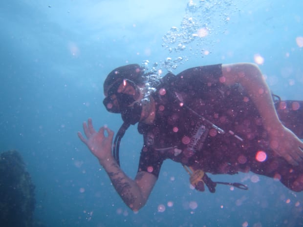 Yet another photo of me in the ocean in scuba gear
