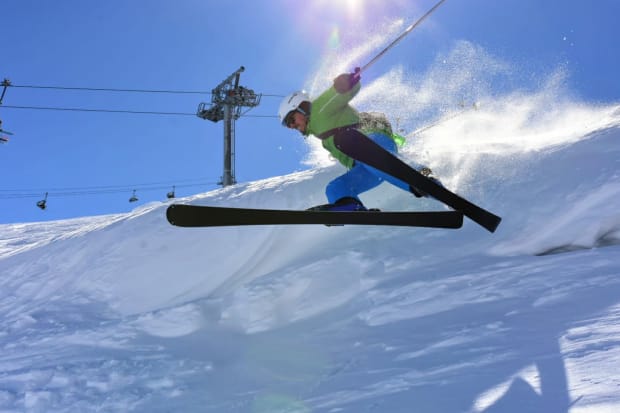 Me, skiing over a snow mount looking fantastic