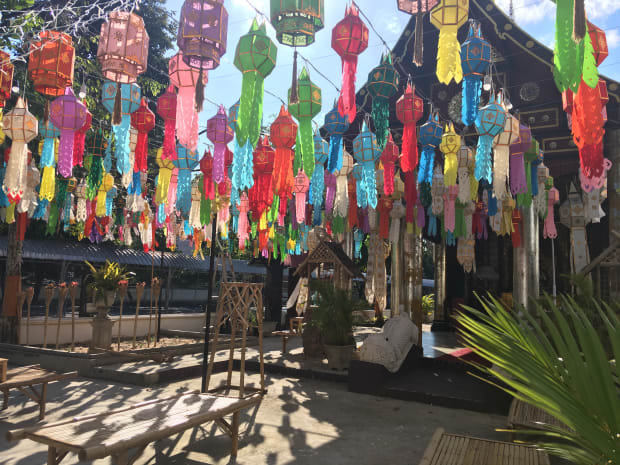 A temple decorated with hanging lanterns