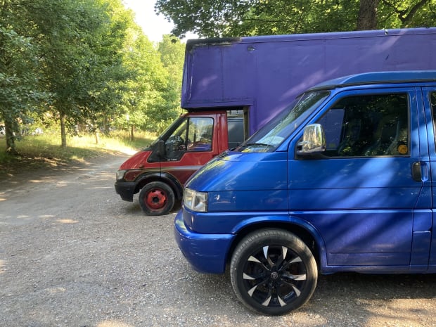 Camping out in a car park next to a much bigger camper van