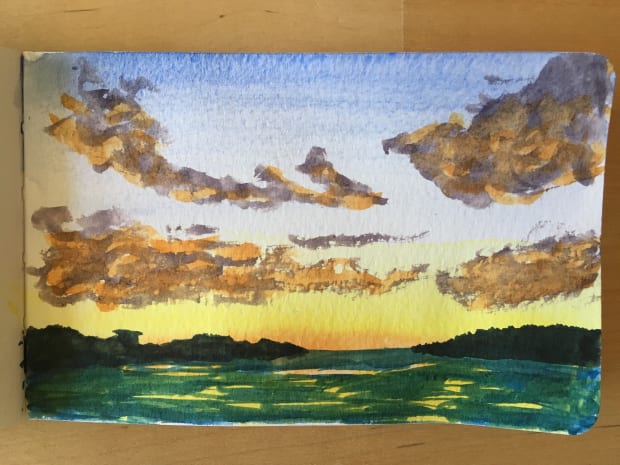 A watercolour painting of a setting sun