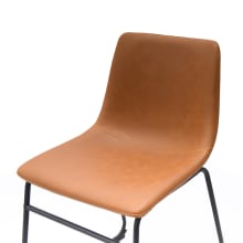 Montana Saddle Dining Chair Rust color Faux Leather Rust