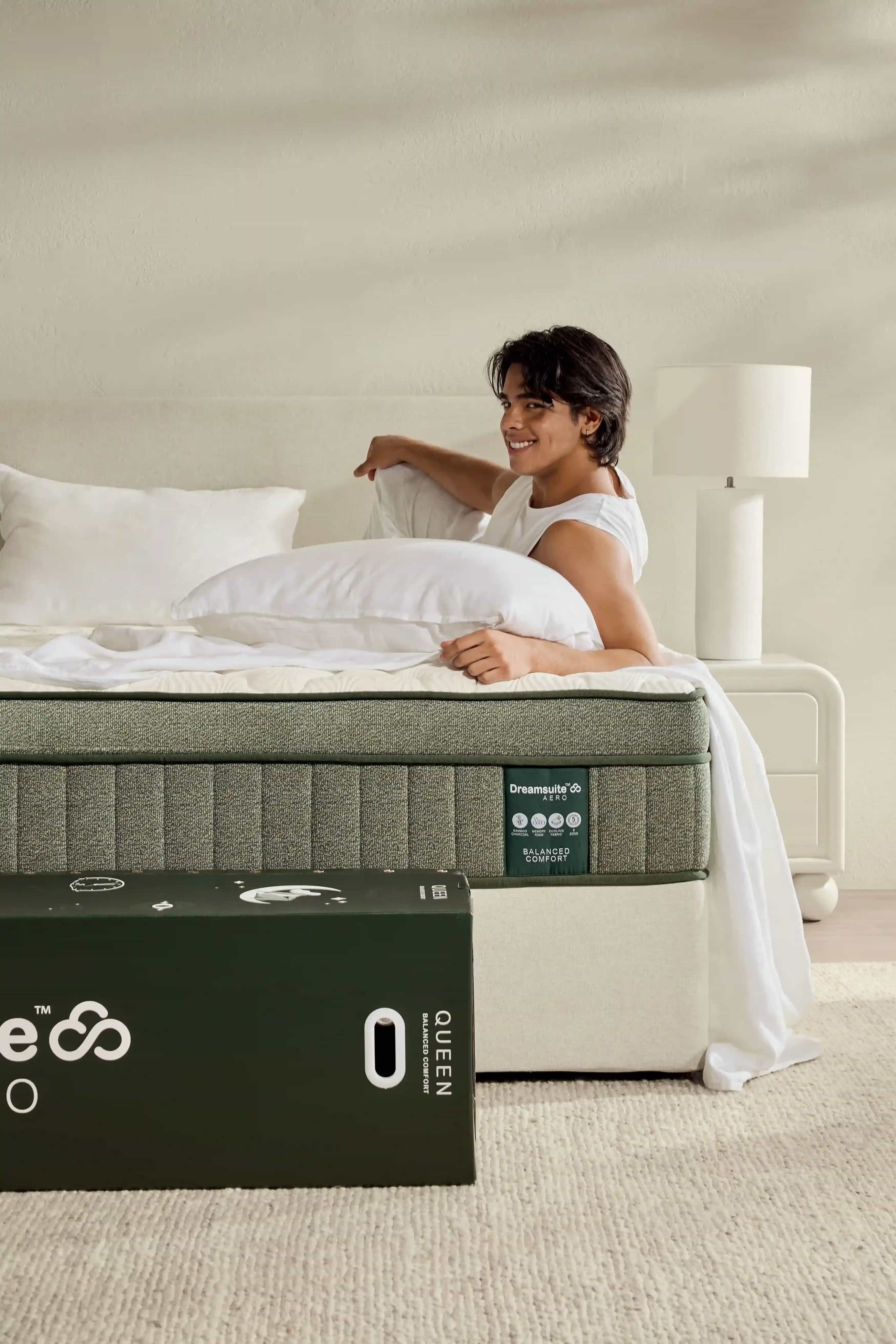 Man stretched out on a Sleeping Giant mattress
