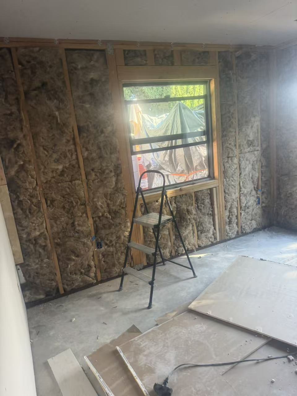 Stud wall framing near a window