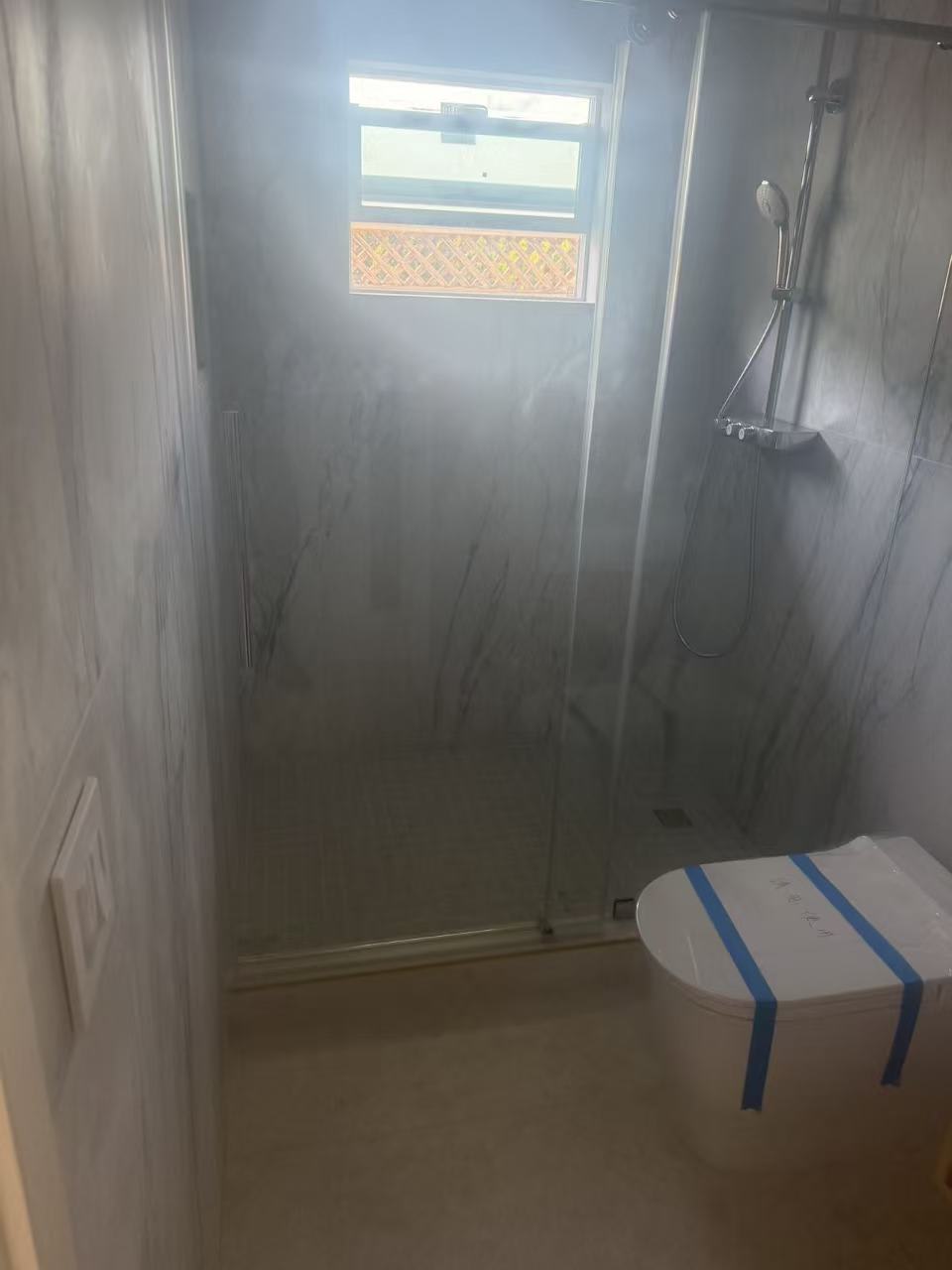 Waterproof membrane applied before tile