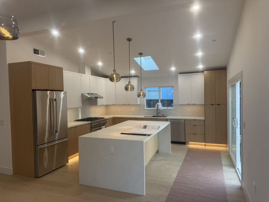 Open-concept kitchen with pendant lighting