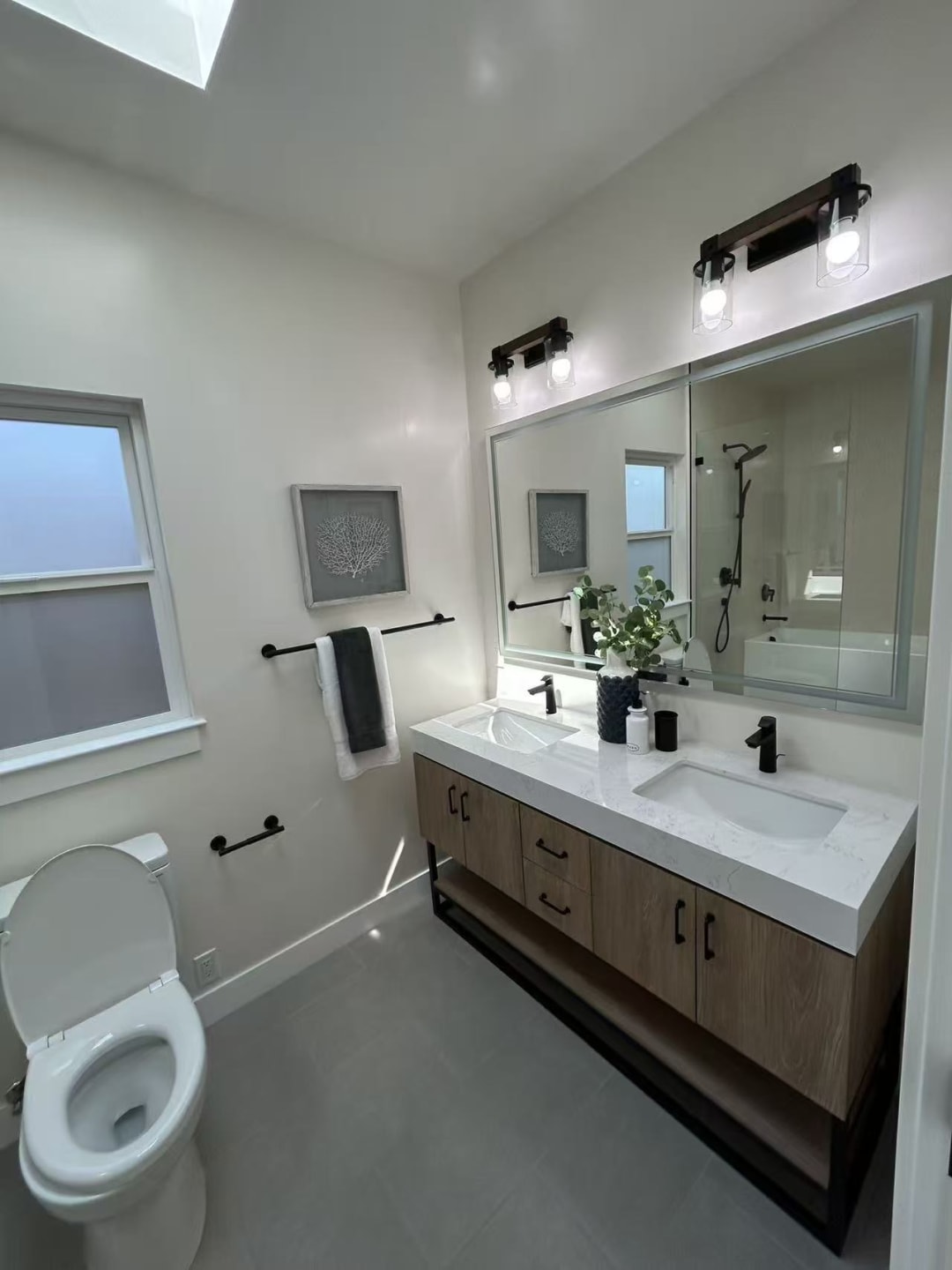 Double vanity with matte black fixtures