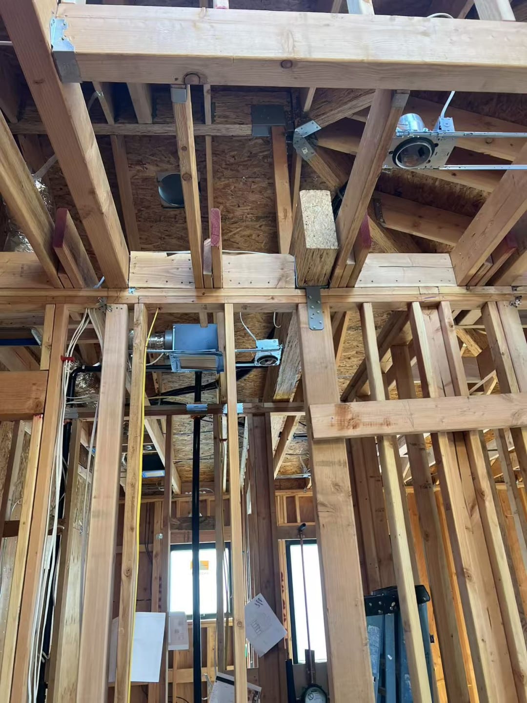 Open ceiling with exposed roof trusses